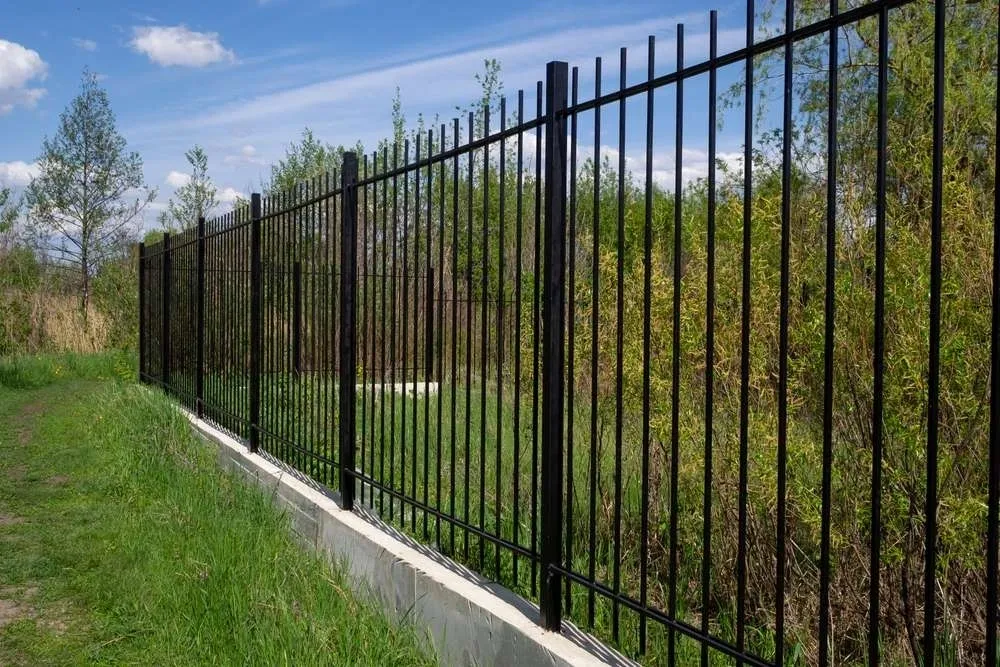 A fence that is made of metal.