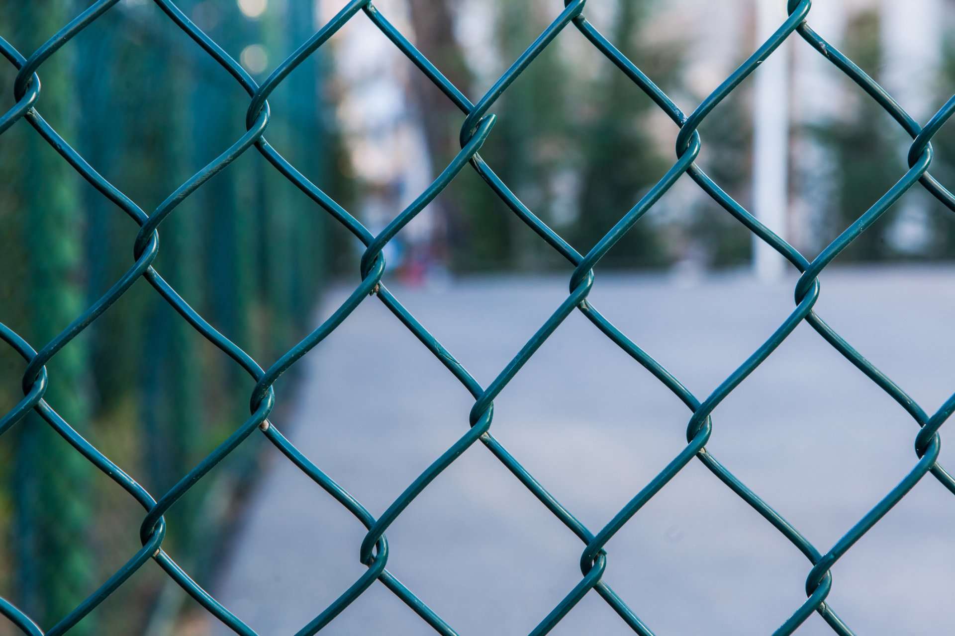 A close up of the chain link fence