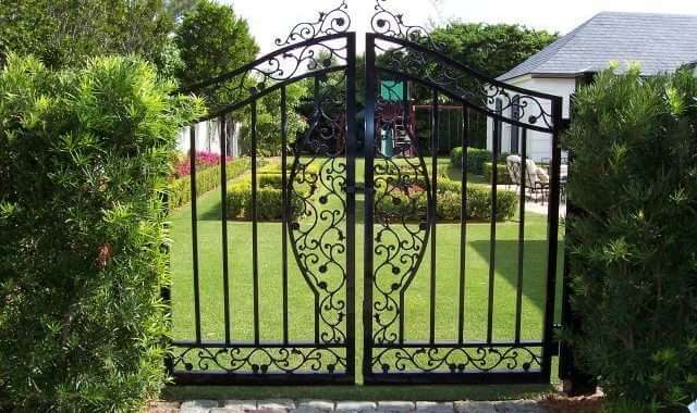 A gate that is open to the yard.